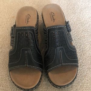 Practically new black Clarks sandals only worn once.